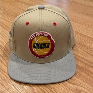 S-O-L-D. 
Mitchell & Ness Houston Rockets Ball cap - Tan and Gray - snap back